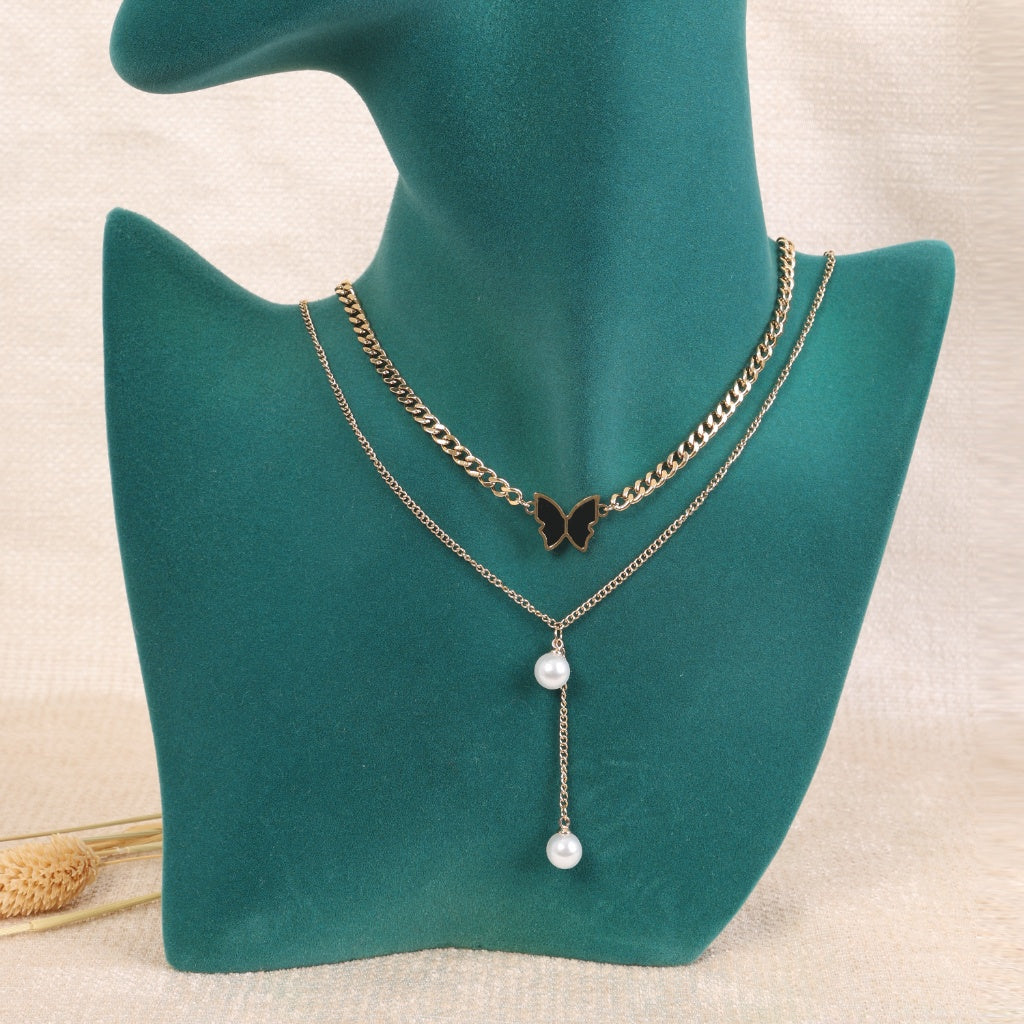 Golden Butterfly and Pearl Necklace