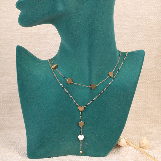 Delicate Gold Layered Necklace with Heart Charms