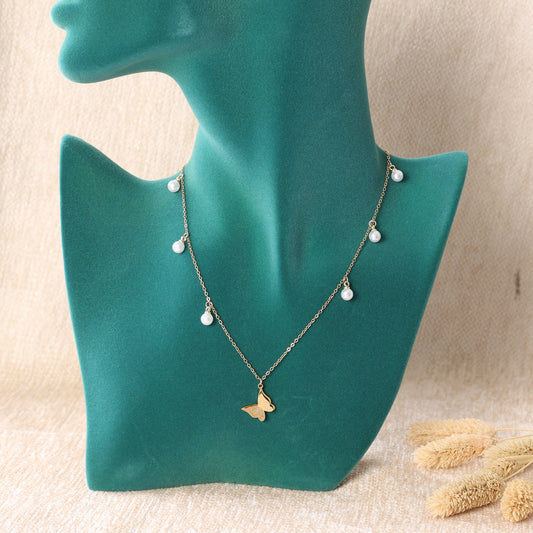 Golden Butterfly and Pearl Necklace