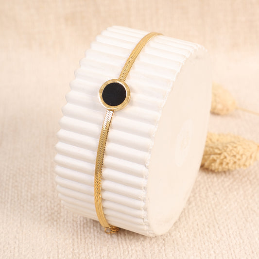 Golden "Herringbone" Bracelet with Black Pendant