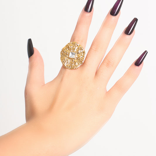 Textured Sunburst Gold Ring with Central Crystal