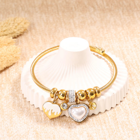 Golden Dangling Hearts Bangle Bracelet